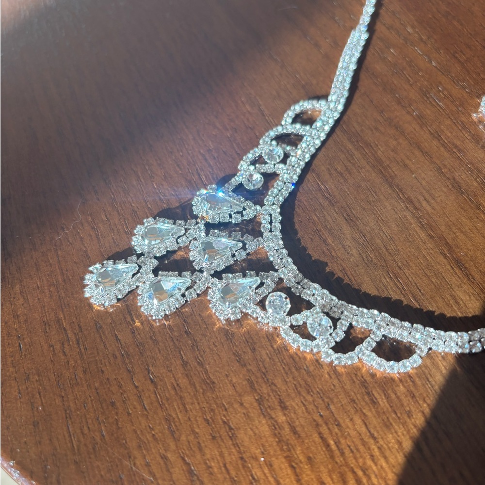 Dazzling Silver Necklace with Teardrop Crystals and matching earrings